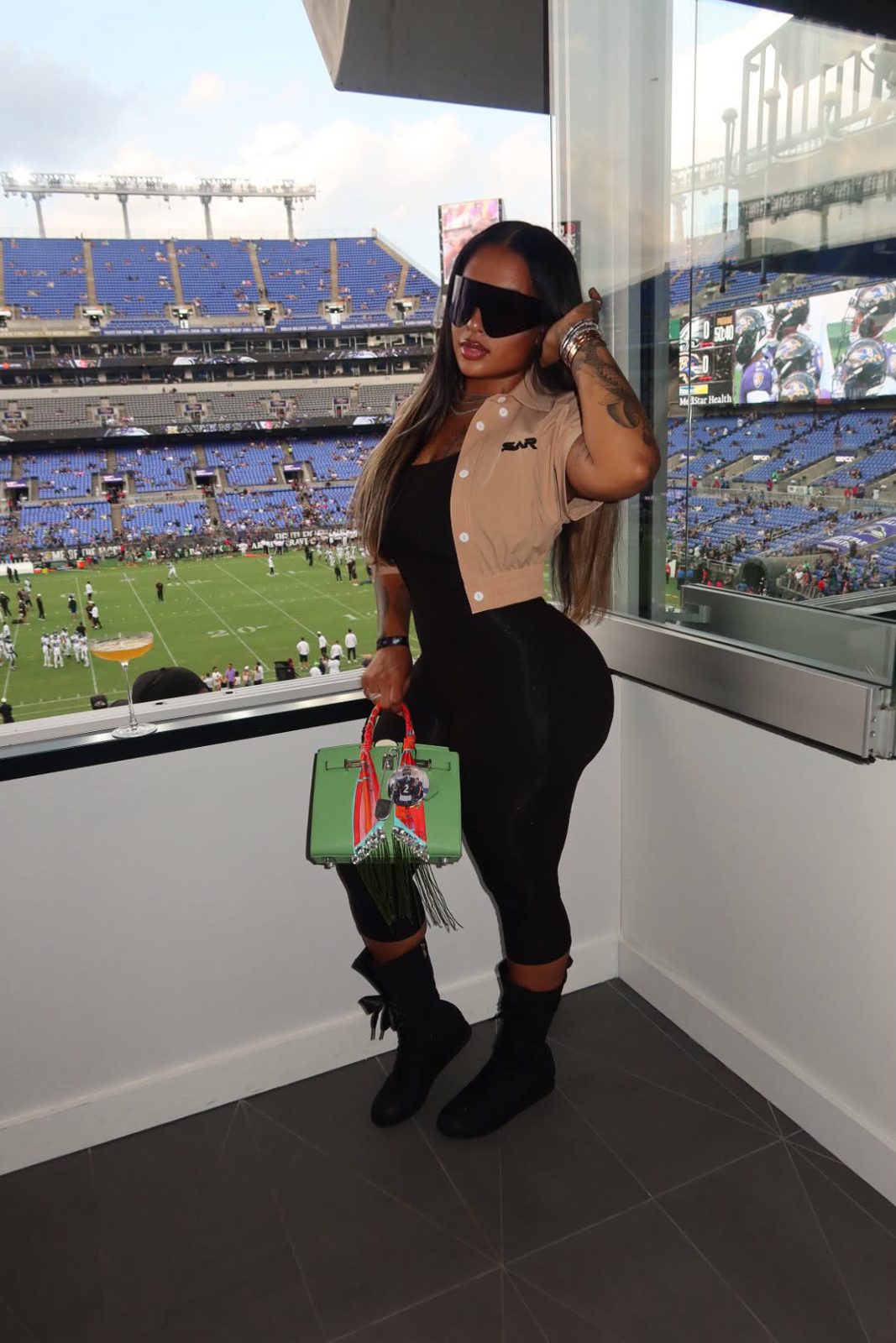 A SAR girl in a SAR top at the stadium